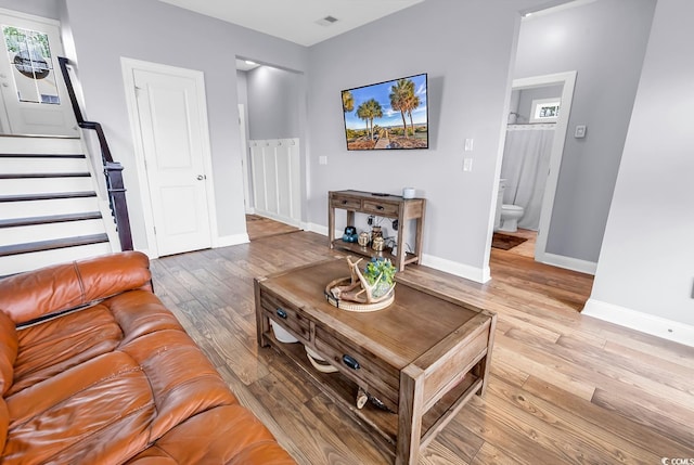 104 Splendor Cir, Murrells Inlet, SC 29576 - living area featuring light wood-style flooring, baseboards, and stairway