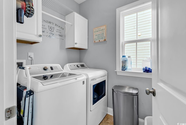 104 Splendor Cir, Murrells Inlet, SC 29576 - laundry room with washer and clothes dryer, cabinet space, plenty of natural light, and baseboards