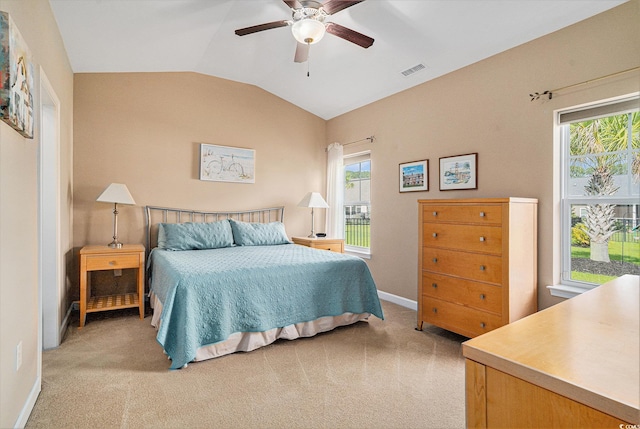 505 Joy Way Ct, Longs, SC 29568 - bedroom featuring light colored carpet, vaulted ceiling, multiple windows, ceiling fan, and baseboards