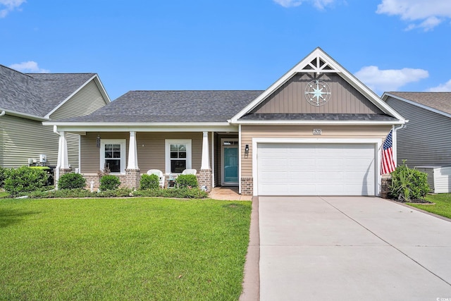 505 Joy Way Ct, Longs, SC 29568 - craftsman-style house with board and batten siding, an attached garage, driveway, a front lawn, and brick siding