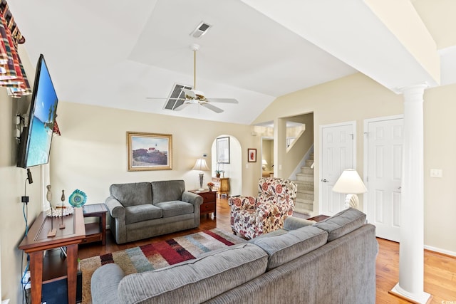 4002 Acorn Way N, Myrtle Beach, SC 29582 - living room featuring decorative columns, stairs, lofted ceiling, ceiling fan, and wood finished floors