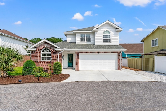 4002 Acorn Way N, Myrtle Beach, SC 29582 - traditional-style house featuring concrete driveway, brick siding, roof with shingles, and a garage
