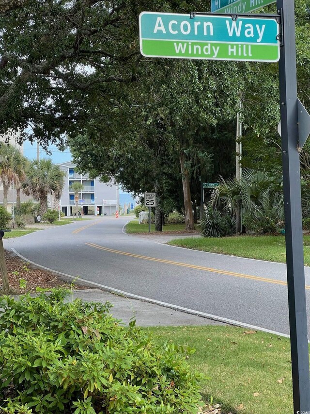 4002 Acorn Way N, Myrtle Beach, SC 29582 - view of asphalt street featuring traffic signs