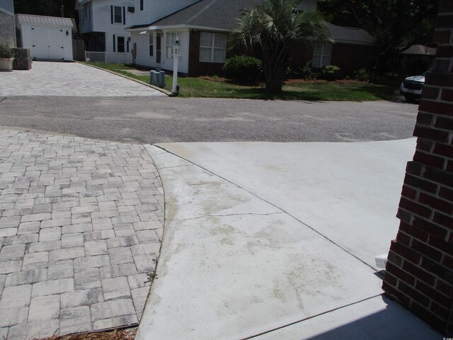 4002 Acorn Way N, Myrtle Beach, SC 29582 - exterior space with decorative driveway and a garage