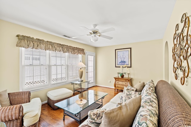 4002 Acorn Way N, Myrtle Beach, SC 29582 - living area with arched walkways, wood finished floors, and ceiling fan