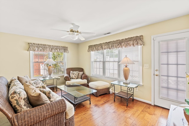 4002 Acorn Way N, Myrtle Beach, SC 29582 - living area with light wood-style floors and a ceiling fan