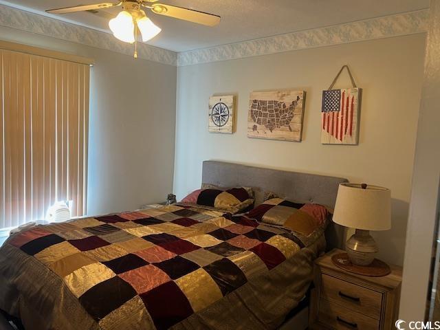 550 Bridgeport Dr, Myrtle Beach, SC 29577 - bedroom with a ceiling fan