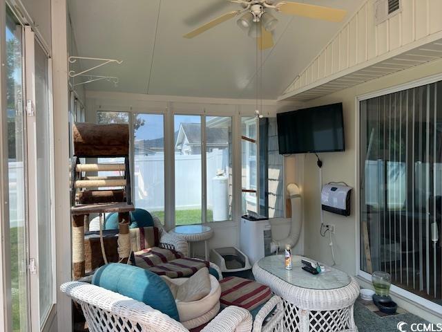 550 Bridgeport Dr, Myrtle Beach, SC 29577 - sunroom with ceiling fan, plenty of natural light, and vaulted ceiling