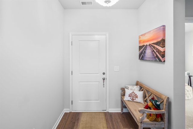1664 White Starfish Ct, Calabash, NC 28467 - doorway to outside featuring wood finished floors and baseboards