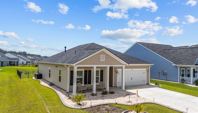 1664 White Starfish Ct, Calabash, NC 28467 - view of front of home featuring a garage, concrete driveway, a shingled roof, and a porch