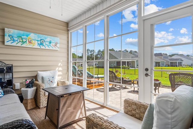 1664 White Starfish Ct, Calabash, NC 28467 - sunroom featuring ceiling fan, healthy amount of natural light, and a residential view