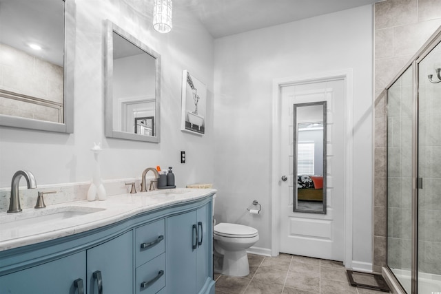 1664 White Starfish Ct, Calabash, NC 28467 - full bath with toilet, double vanity, a stall shower, and tile patterned flooring