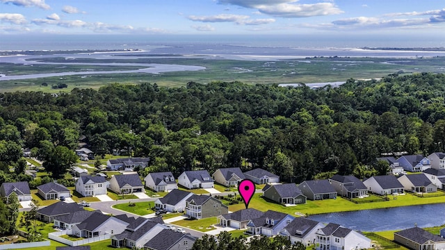 1664 White Starfish Ct, Calabash, NC 28467 - aerial perspective of suburban area with a nearby body of water