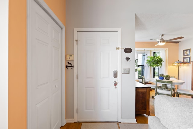 1422 Baldwin Ct Unit 1422, Little River, SC 29566 - foyer entrance featuring wood finished floors, a ceiling fan, and baseboards