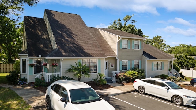 1422 Baldwin Ct Unit 1422, Little River, SC 29566 - view of front of home with uncovered parking and a shingled roof