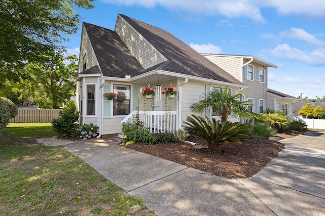 1422 Baldwin Ct Unit 1422, Little River, SC 29566 - view of front of property featuring a porch and a shingled roof