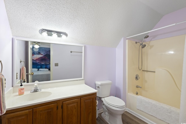 1422 Baldwin Ct Unit 1422, Little River, SC 29566 - full bath with vaulted ceiling, toilet, bathing tub / shower combination, vanity, and wood finished floors
