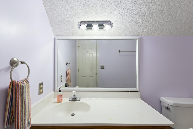 1422 Baldwin Ct Unit 1422, Little River, SC 29566 - bathroom with vanity, toilet, and a textured ceiling