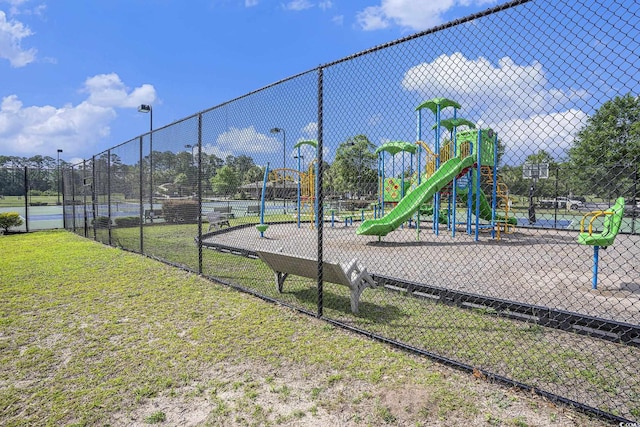 community play area with a tennis court