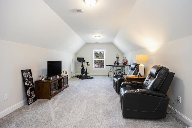 living area with carpet flooring, vaulted ceiling, and baseboards