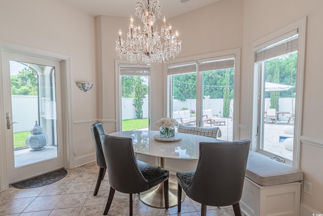 616 Edgecreek Dr, Myrtle Beach, SC 29579 - dining space featuring a chandelier, baseboards, and light tile patterned floors