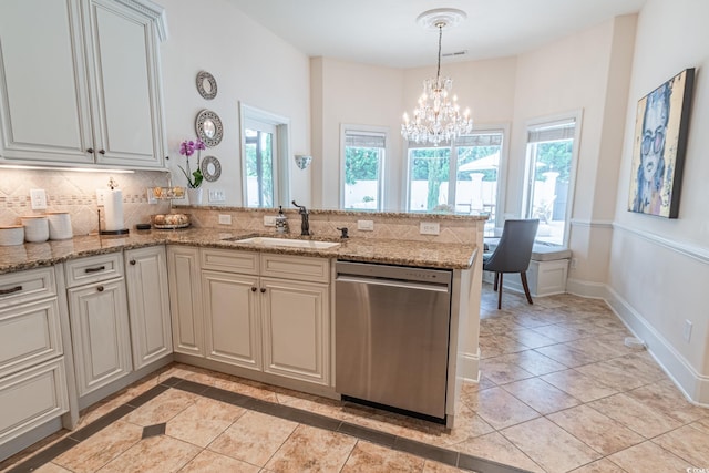 616 Edgecreek Dr, Myrtle Beach, SC 29579 - kitchen with dishwasher, a sink, healthy amount of natural light, and a peninsula