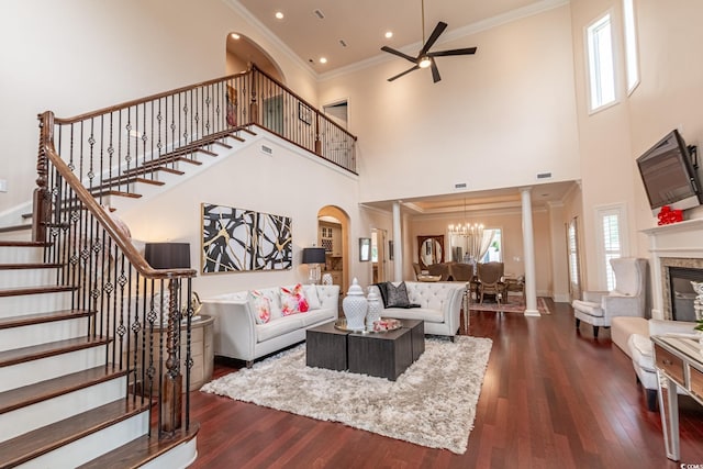 616 Edgecreek Dr, Myrtle Beach, SC 29579 - living area with a ceiling fan, a chandelier, stairway, a towering ceiling, and ornamental molding