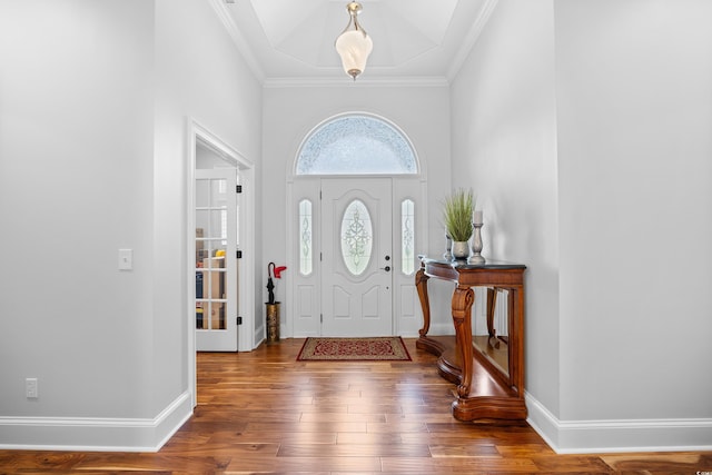 423 Chapman Loop, Pawleys Island, SC 29585 - entryway with wood-type flooring, baseboards, and crown molding