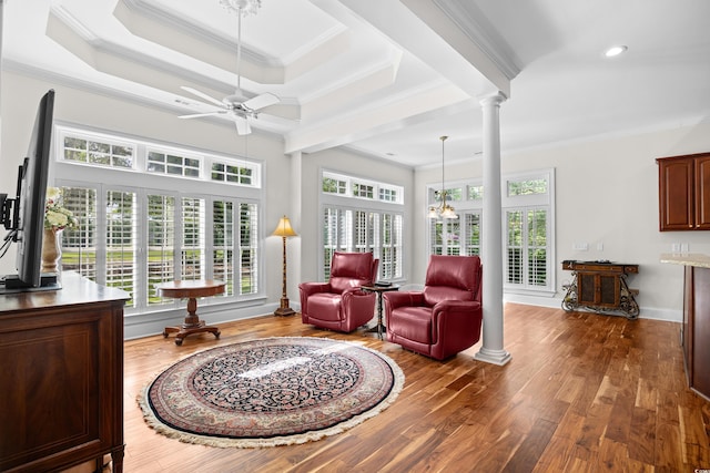 423 Chapman Loop, Pawleys Island, SC 29585 - living area featuring ornate columns, crown molding, ceiling fan, healthy amount of natural light, and recessed lighting