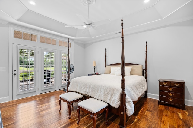 423 Chapman Loop, Pawleys Island, SC 29585 - bedroom featuring a raised ceiling, access to outside, wood finished floors, recessed lighting, and baseboards