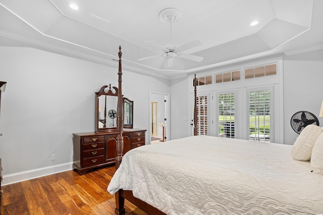 423 Chapman Loop, Pawleys Island, SC 29585 - bedroom with a tray ceiling, access to exterior, wood finished floors, recessed lighting, and baseboards