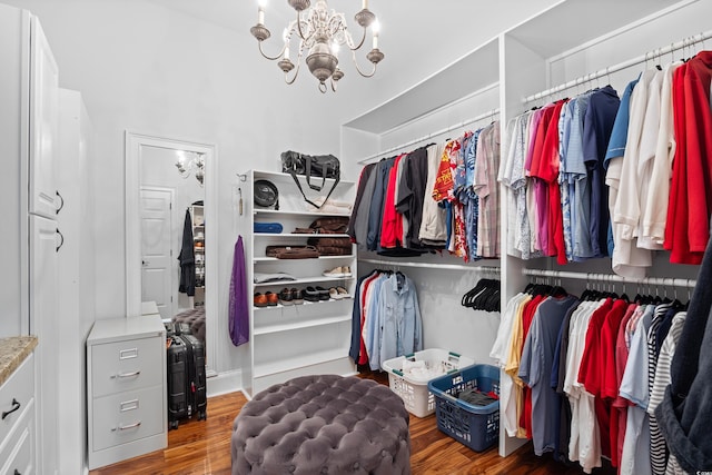 423 Chapman Loop, Pawleys Island, SC 29585 - walk in closet with wood finished floors and a chandelier
