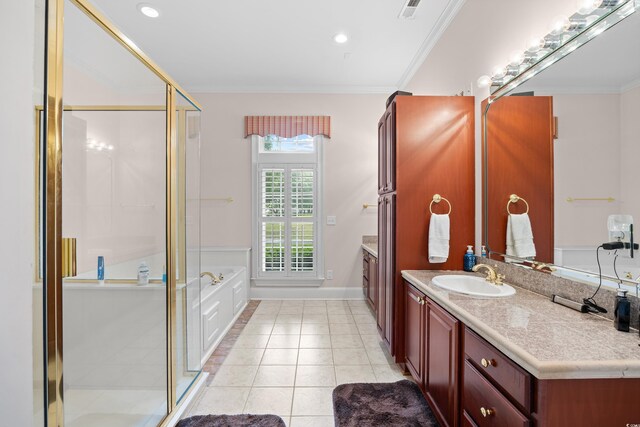 423 Chapman Loop, Pawleys Island, SC 29585 - bathroom with vanity, a stall shower, tile patterned floors, crown molding, and a garden tub