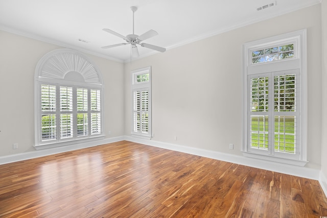423 Chapman Loop, Pawleys Island, SC 29585 - empty room featuring wood finished floors, crown molding, baseboards, and ceiling fan