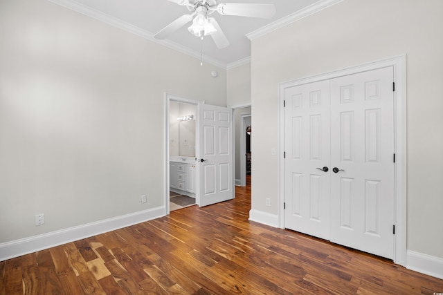 423 Chapman Loop, Pawleys Island, SC 29585 - unfurnished bedroom with crown molding, wood finished floors, baseboards, a closet, and ensuite bathroom