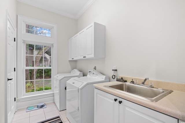 423 Chapman Loop, Pawleys Island, SC 29585 - laundry room with cabinet space, washing machine and clothes dryer, light tile patterned floors, crown molding, and healthy amount of natural light