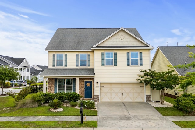 1189 Wyatt Ln, Myrtle Beach, SC 29577 - view of front of property featuring stone siding, concrete driveway, a garage, roof with shingles, and a front lawn