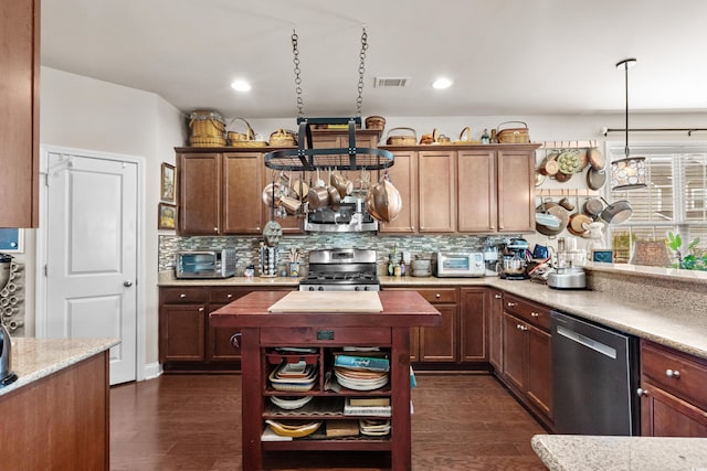 1189 Wyatt Ln, Myrtle Beach, SC 29577 - kitchen with appliances with stainless steel finishes, tasteful backsplash, dark wood-style floors, open shelves, and recessed lighting