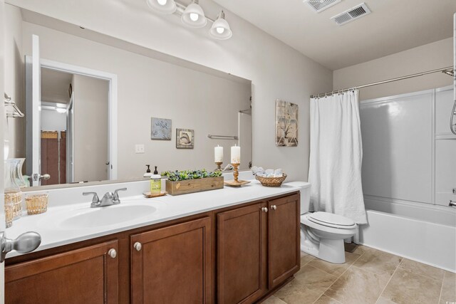 1189 Wyatt Ln, Myrtle Beach, SC 29577 - bathroom featuring vanity, toilet, and shower / tub combo with curtain