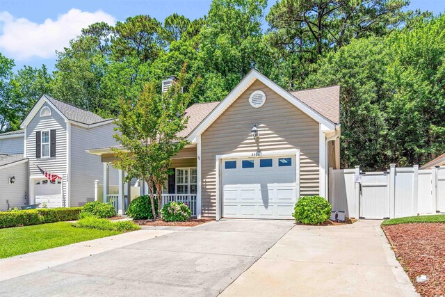 4406 Barcelona Ln, Little River, SC 29566 - view of front facade featuring driveway, a gate, a porch, a garage, and roof with shingles