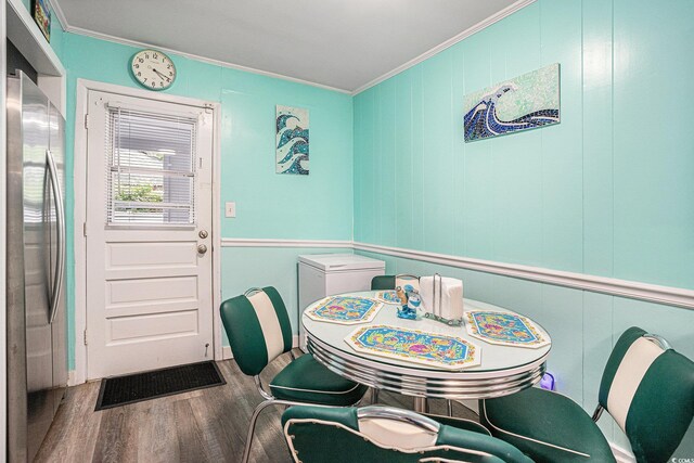 1205 King St, Myrtle Beach, SC 29577 - dining area with ornamental molding and wood finished floors