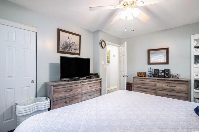1205 King St, Myrtle Beach, SC 29577 - bedroom with stacked washer / drying machine, a ceiling fan, and baseboards