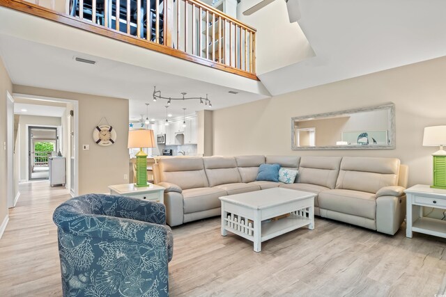 430 Ocean Creek Dr Unit 2534, Myrtle Beach, SC 29572 - living area with light wood-type flooring and baseboards