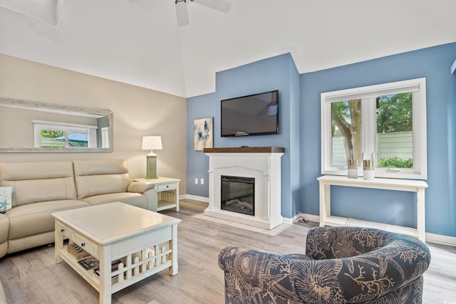 430 Ocean Creek Dr Unit 2534, Myrtle Beach, SC 29572 - living room featuring baseboards, wood finished floors, and healthy amount of natural light