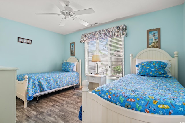 430 Ocean Creek Dr Unit 2534, Myrtle Beach, SC 29572 - bedroom with wood finished floors and ceiling fan