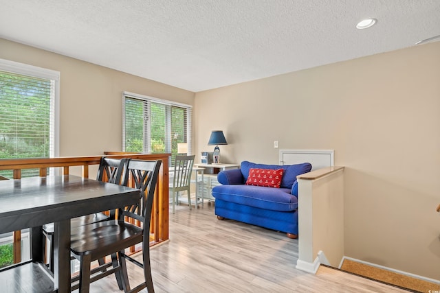 430 Ocean Creek Dr Unit 2534, Myrtle Beach, SC 29572 - dining area with a textured ceiling, light wood-style flooring, baseboards, and recessed lighting