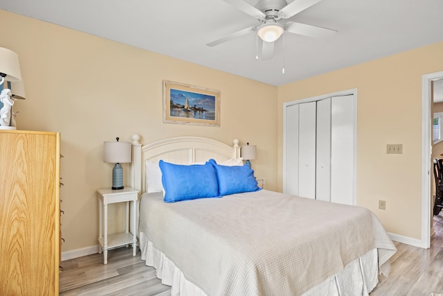430 Ocean Creek Dr Unit 2534, Myrtle Beach, SC 29572 - bedroom featuring a closet, wood finished floors, and baseboards