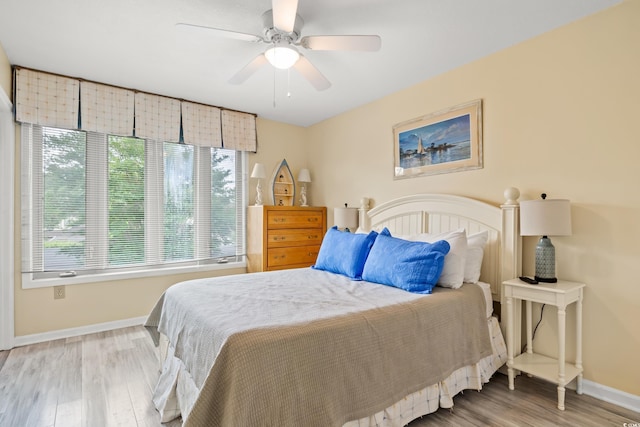 430 Ocean Creek Dr Unit 2534, Myrtle Beach, SC 29572 - bedroom with baseboards, wood finished floors, and a ceiling fan