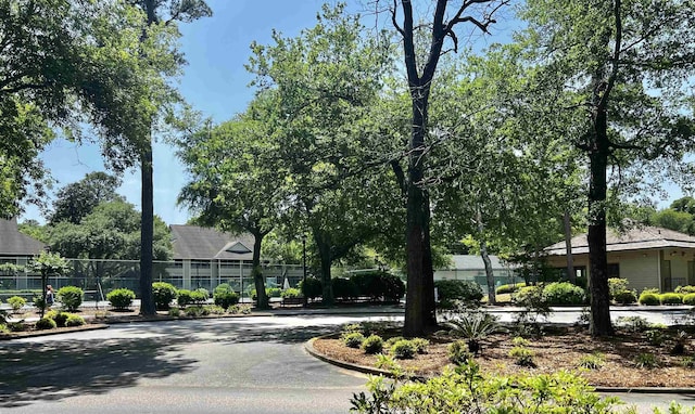 430 Ocean Creek Dr Unit 2534, Myrtle Beach, SC 29572 - view of asphalt road featuring curbs