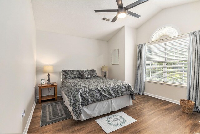 2479 Glen Dr, Little River, SC 29566 - bedroom featuring baseboards, lofted ceiling, wood finished floors, and a ceiling fan